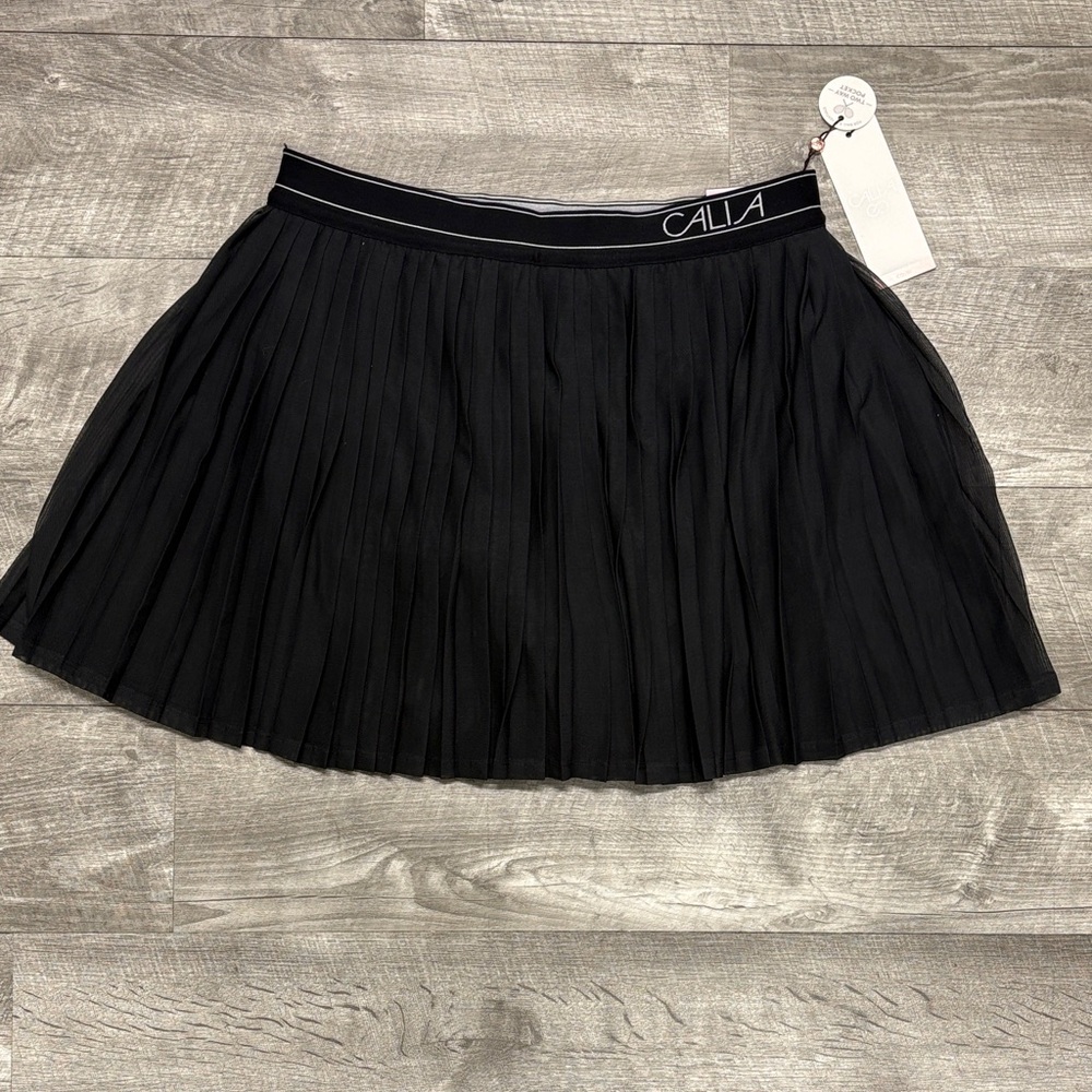 CALIA by Carrie Underwood Black Pleated Skater Skirt